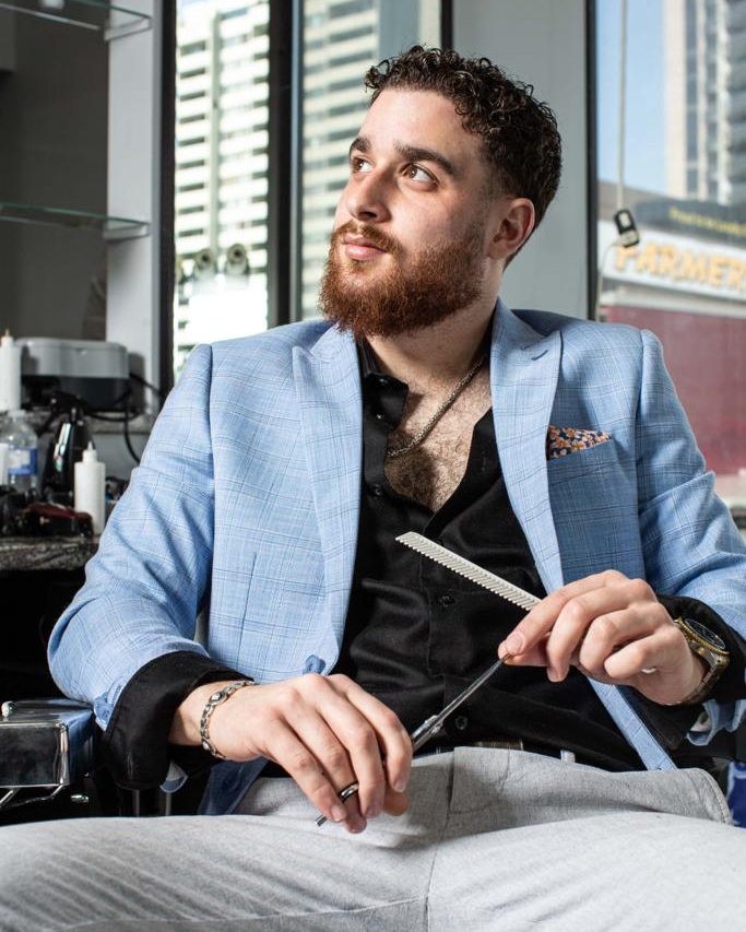 Adam, barber at Khalil Barbershop